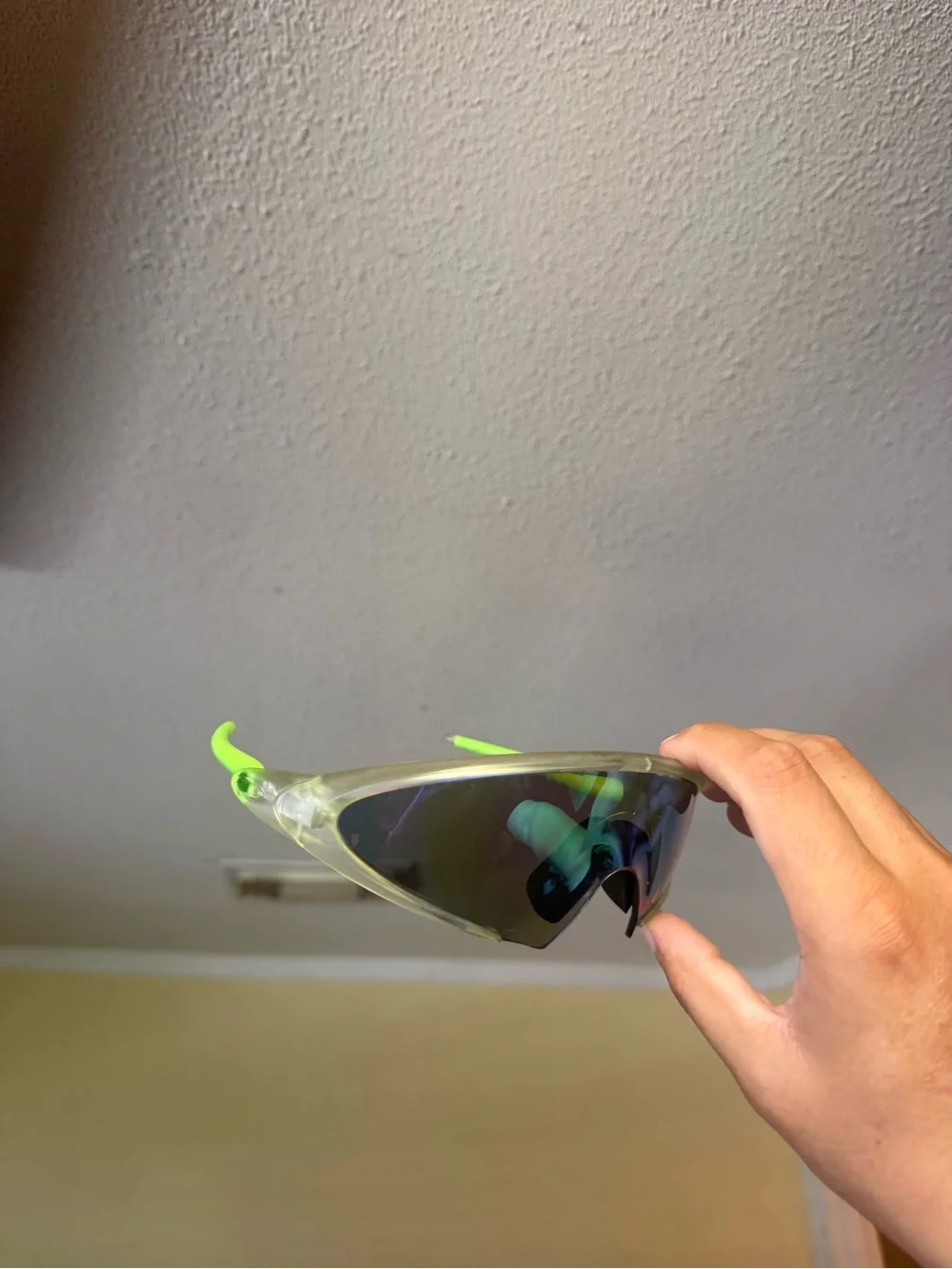 Sport Wrap Sunglasses in Clear Frame with Neon Green Temples Oakley